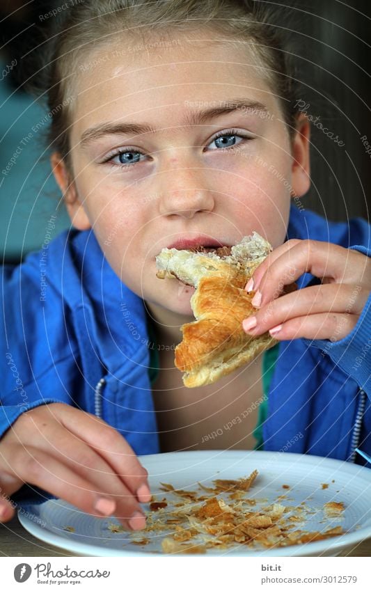 Enjoy with sensitivity... Human being Feminine Child girl Eating To enjoy Croissant Fingers by hand Colour photo Interior shot Studio shot Close-up
