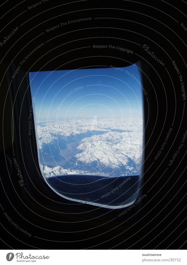 small world Window Vantage point Airplane Aviation Alps Snow Mountain
