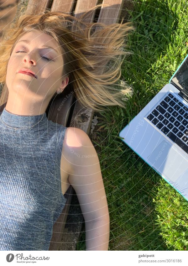 Homeoffice young woman with laptop lying on a bench. Lifestyle Well-being Relaxation Meditation Summer Sunbathing Flat (apartment) Human being Feminine