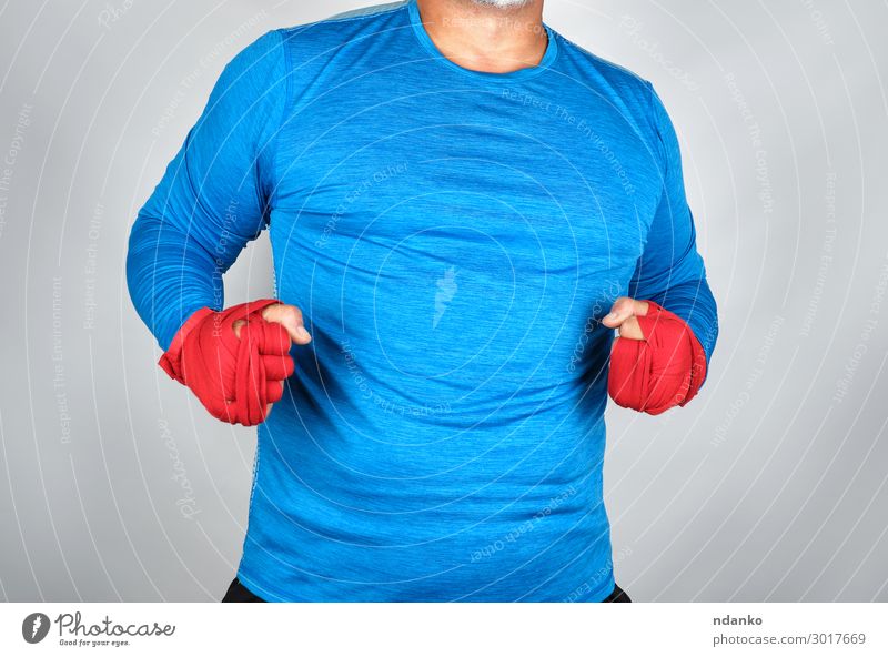 adult athlete in blue clothes Lifestyle Body Athletic Fitness Sports Sports Training Human being Masculine Man Adults Hand 1 30 - 45 years Stand Aggression