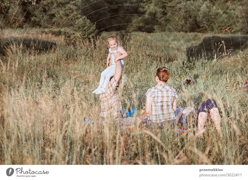 Family spending time together on a meadow Lifestyle Joy Happy Relaxation Vacation & Travel Trip Summer Summer vacation Child Human being Girl Woman Adults Man