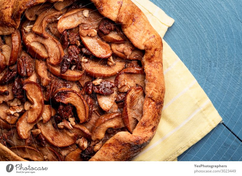 Homemade apple galette with pecan nuts. Autumn dessert Fruit Apple Cake Dessert Candy Warmth Fresh Delicious Many Gold Tradition Thanksgiving day above view