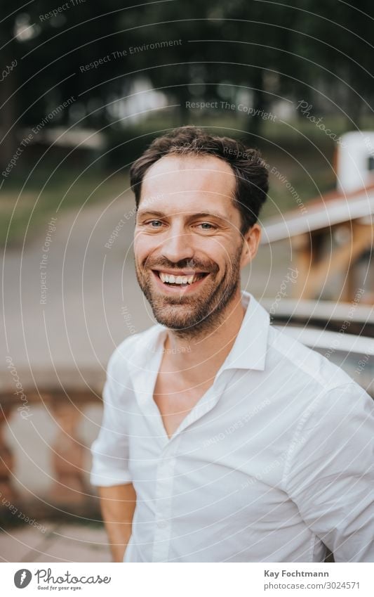 cheerful laughing man in white shirt attractive beard bearded caucasian confident friendly guy handsome happiness happy lifestyle looking male masculine outdoor