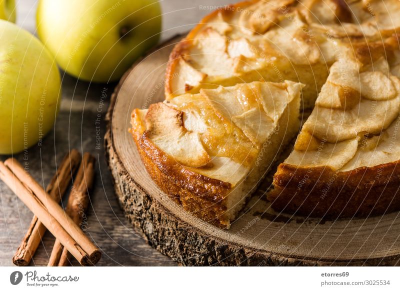Homemade apple pie on wooden table. Apple Pie Dessert Baked goods Slice Fruit Food Healthy Eating Food photograph Autumn Dough tart seasonal Home-made Tradition