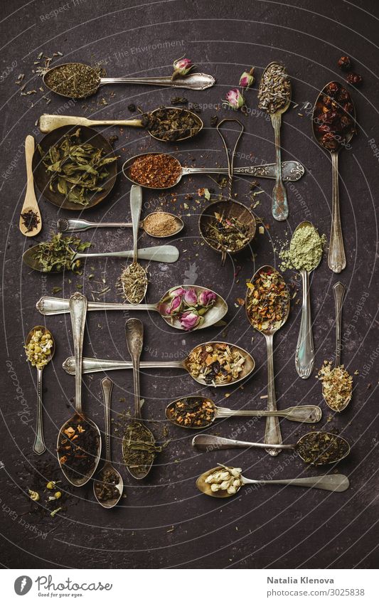 Assortment of dry tea in vintage spoons aromatic assortment background beverage black breakfast ceylon chinese collection copy copyspace different drink flower