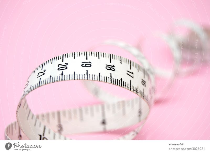white measuring tape isolated on pink background Tape measure Centimeter Pink White Meter Diet Beauty Photography Conceptual design Fitness instrument weight