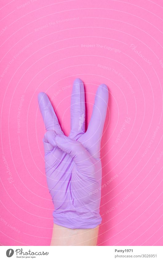 hand in front of a pink background, wearing medical protective glove and holding three fingers up Health care Hand Fingers Human being 13 - 18 years