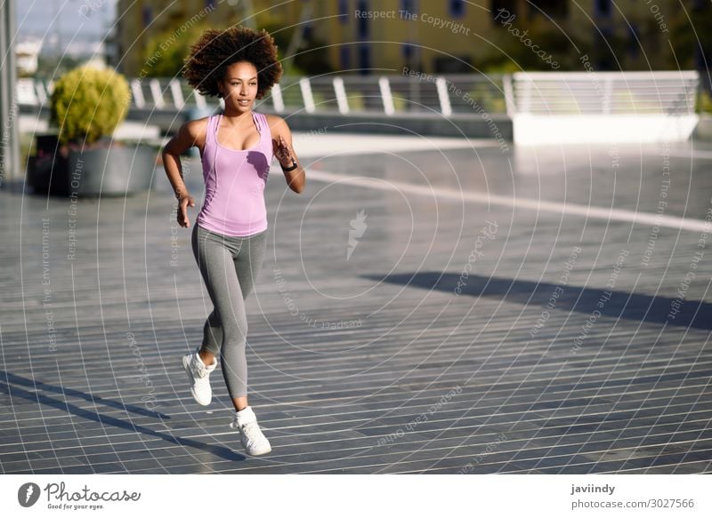 Black woman, afro hairstyle, running outdoors Lifestyle Beautiful Hair and hairstyles Wellness Leisure and hobbies Sports Jogging Human being Feminine