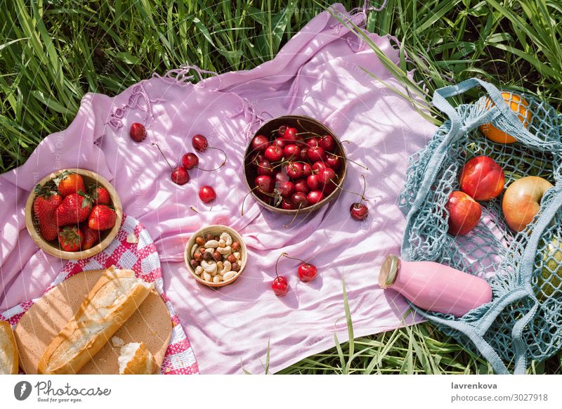 Zero waste summer picnic Sustainability Picnic Apple Baguette Berries Bottle Bread Bright Cherry Food Healthy Eating Dish Food photograph Fresh Grass Hat Hot