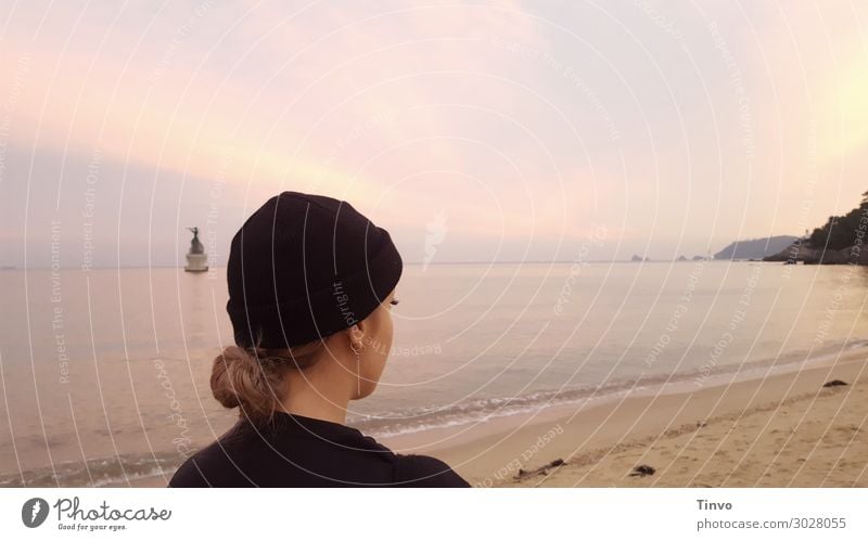 Woman at dusk on the beach Young woman Youth (Young adults) 1 Human being 18 - 30 years Adults Sunrise Sunset Beautiful weather Coast Beach Ocean Cap Wanderlust