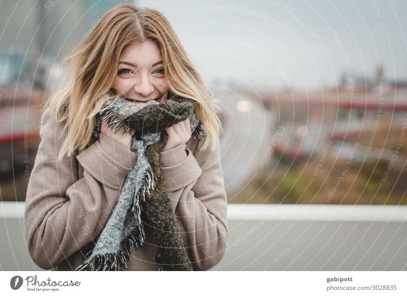young woman with scarf smiles into the camera Lifestyle Well-being Winter Human being Feminine Young woman Youth (Young adults) 1 18 - 30 years Adults Scarf