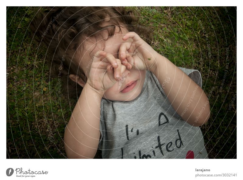 sleepy girl Human being Child Baby Toddler 1 - 3 years Garden Playing Authentic Dirty Gray Green Joy Boredom Infancy Colour photo Exterior shot Closed eyes