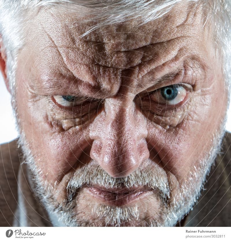 Portrait of an older man with intensive eye contact portrait Man Looking Eyes Close-up Facial hair Anxious Masculine Face Emotions Resolve Aggression Dispute