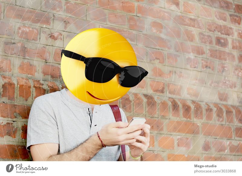 Emoji head man Lifestyle Style Happy Business To talk Telephone PDA Technology Internet Human being Boy (child) Man Adults Smiling Sit Stand