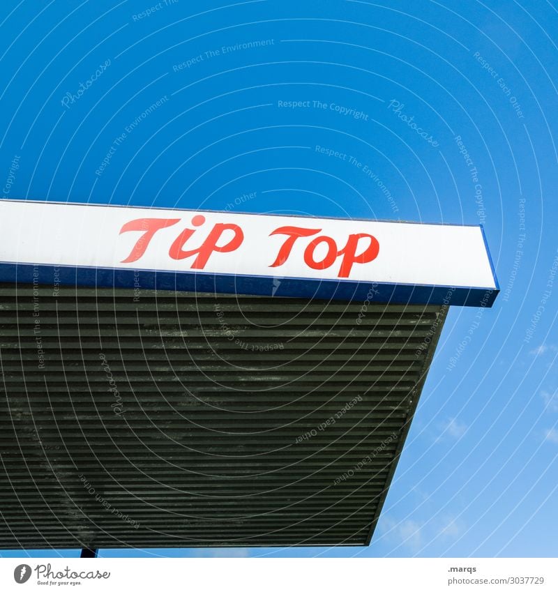 Tip Top Tank Cloudless sky Petrol station Advertising tip top Characters Red White Cheap Gasoline Refuel Colour photo Exterior shot Deserted Copy Space left