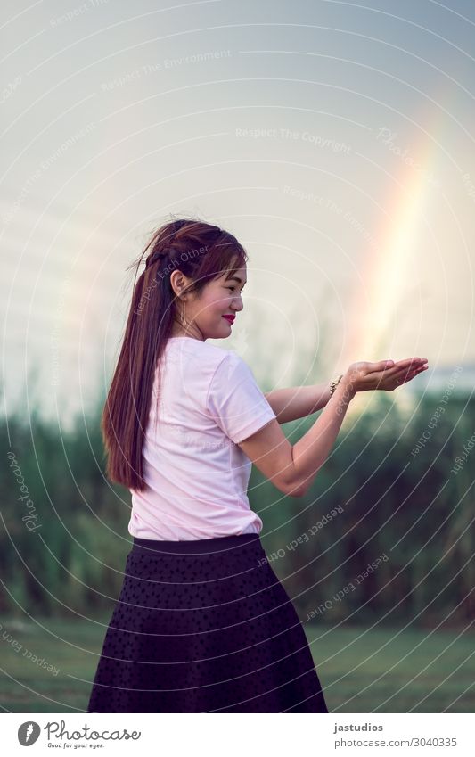 Mujigae Young woman Youth (Young adults) Hand 1 Human being 13 - 18 years Environment Sky Beautiful weather Grass Braids Observe Discover To enjoy Stand Rainbow