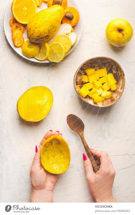 Prepare the mango. Hands holding empty mango bowl and spoon Food Fruit Nutrition Organic produce Vegetarian diet Diet Crockery Bowl Spoon Style Design