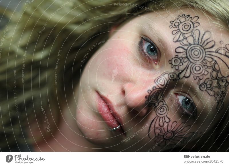 Woman with painted face Creativity Art Culture Tattoo Blonde Painted Exceptional Moody Piercing Young woman Adults Exotic Free Hip & trendy naturally Emotions