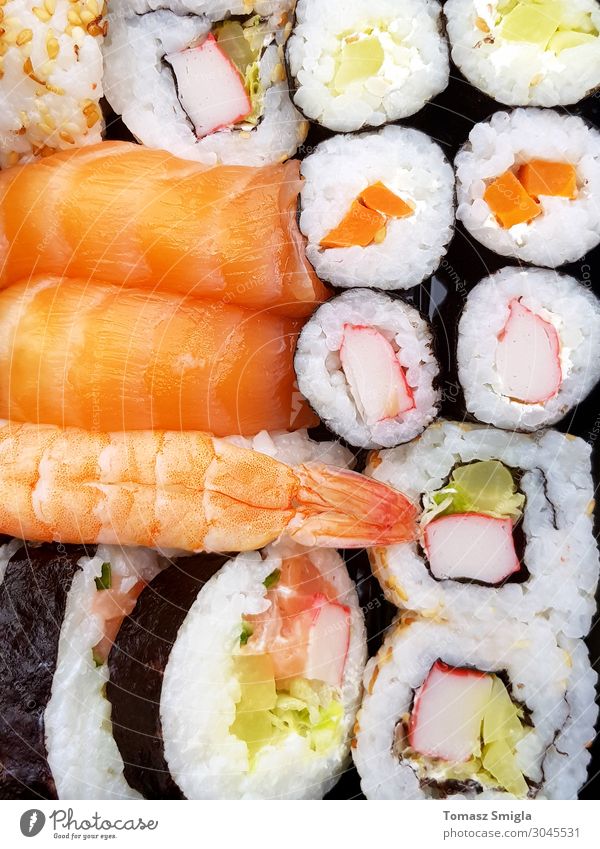 Fresh delicious well made sushi rolls seen from above Fish Seafood Lunch Dinner Diet Sushi Plate Restaurant Culture Pack Delicious Above Juicy White Tradition