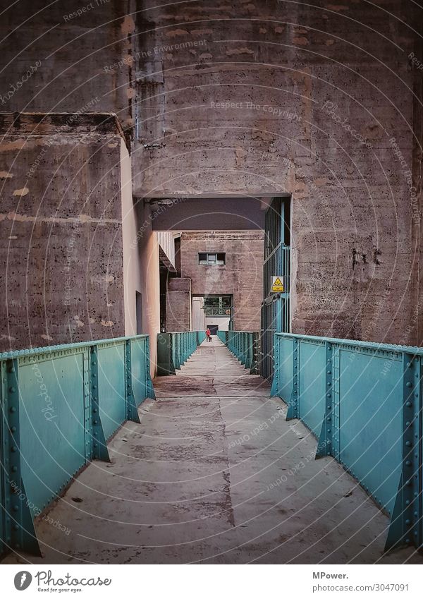 on the dam. Technology Human being 1 Old Concrete Steel Manmade structures Retaining wall Industry Gloomy Lanes & trails Passage Colour photo Exterior shot