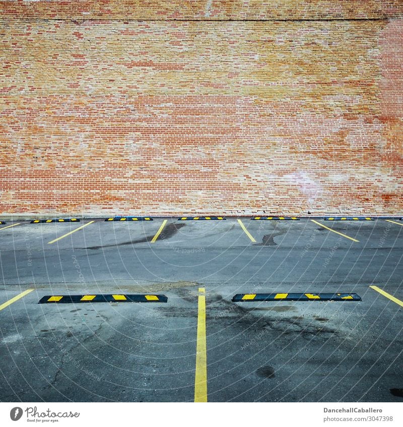 Where's my car...? Town Architecture Wall (barrier) Wall (building) Facade Transport Road traffic Motoring Car Free Modern Yellow Gray Orange Red Design