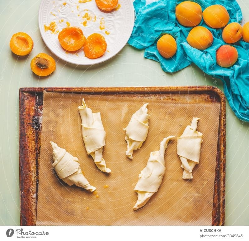 Rolled dough on baking tray. Apricot Croissants Food Fruit Nutrition Breakfast Crockery Design Living or residing Style Baked goods Baking tray Food photograph