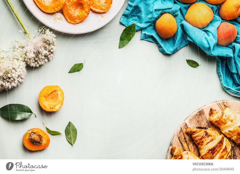 Croissants and apricots for breakfast Food Fruit Nutrition Breakfast Organic produce Crockery Design Living or residing Table Background picture Apricot
