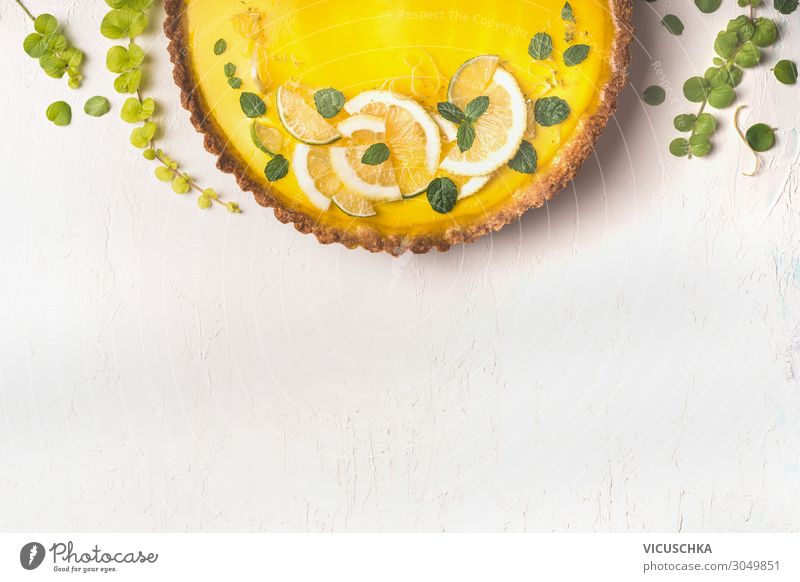 Lemon tart with lemon slices and mint Food Fruit Cake Dessert Nutrition Organic produce Style Design Summer Gastronomy Yellow Background picture Gourmet