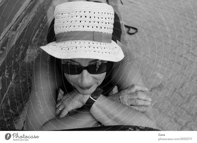 holiday happiness Calm Summer vacation Sun Sunbathing Bench Human being Woman Adults Face 45 - 60 years Hat Sunhat Relaxation To enjoy Smiling Lie Happy