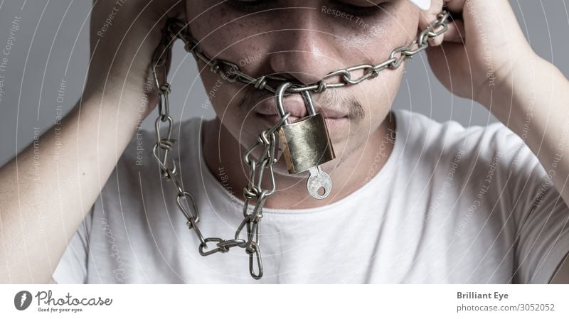 Disconnect chains Human being Masculine 1 18 - 30 years Youth (Young adults) Adults Chain Lock Metal Sign Key Diet Fight Threat Dark Rebellious Vice Bravery