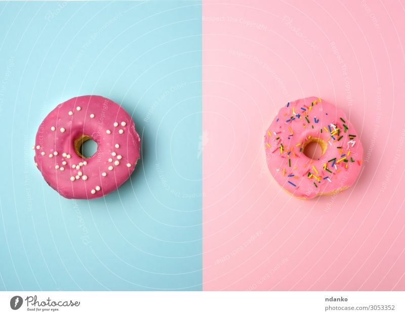 two whole round pink donuts with colored sprinkles Cake Dessert Candy Nutrition Breakfast Decoration Feasts & Celebrations Eating Exceptional Fresh Bright
