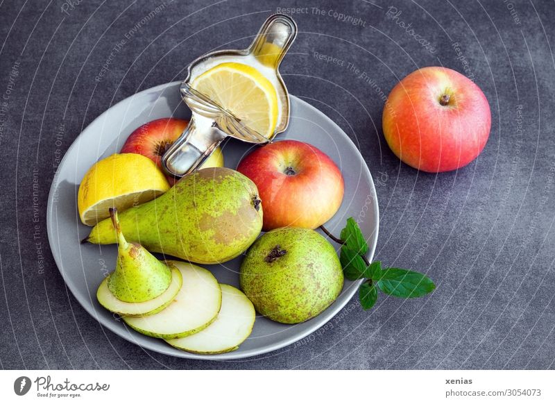 Fruit plate with pear, apple and lemon Food Apple Pear Lemon Mint Nutrition Organic produce Vegetarian diet Diet Plate Lifestyle Healthy Eating Fresh Juicy Sour
