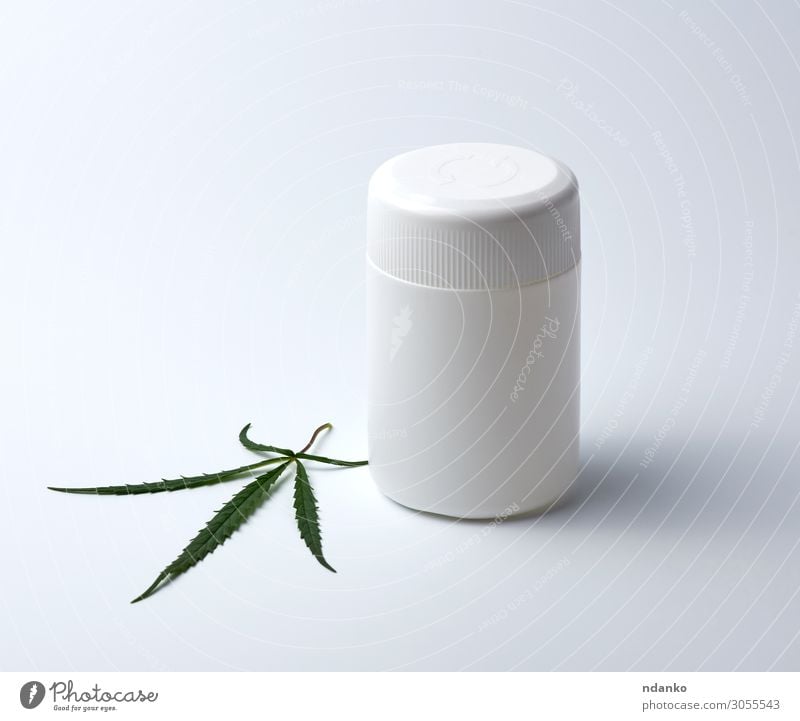 empty white plastic medical jar for pills and green hemp leaf Alternative medicine Intoxicant Medication Culture Nature Plant Grass Leaf Plastic Natural Clean