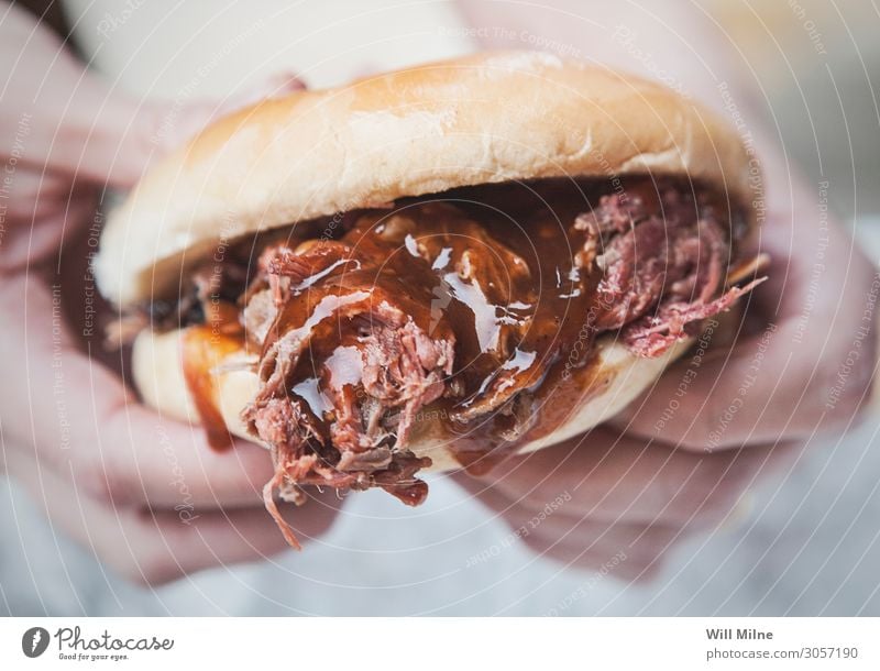 Close-up Shot of a Barbecue Sandwich Barbecue (apparatus) Barbecue (event) BBQ Hand Hold Sauce Trickle Dripping Food Dish Food photograph Lunch Dinner Bread