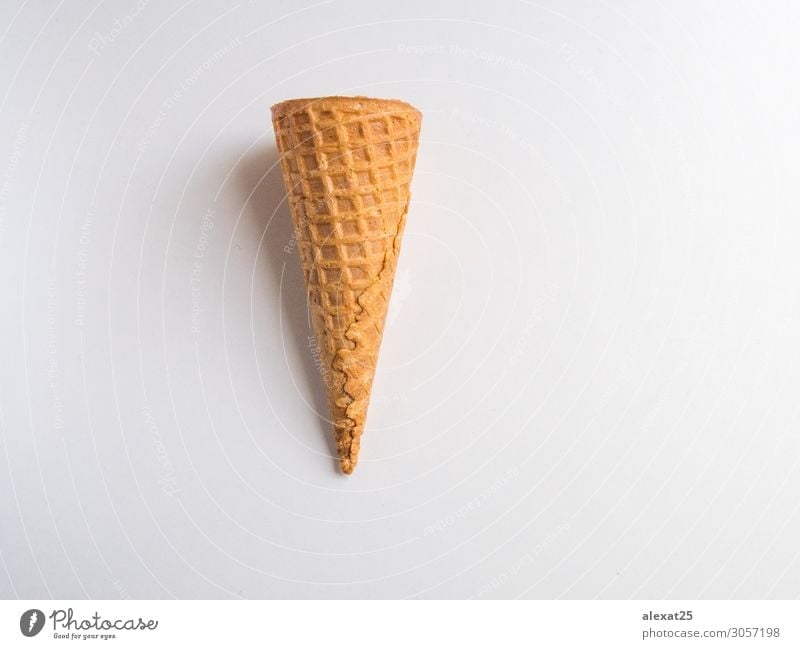 Ice cream cone on white background Dessert Summer Gastronomy Fresh Delicious White Calorie cold cornet empty flavor food Horizontal ice isolated Photography