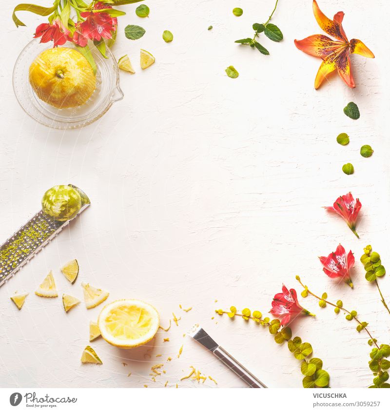 Lemon juice, lemon peel and flower frame Food Fruit Nutrition Beverage Juice Crockery Style Design Healthy Eating Yellow food background flowers top view