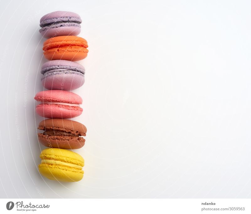 colorful baked macarons almond flour Cake Dessert Candy Nutrition Eating Fresh Delicious Above Brown Yellow Pink White Colour Tradition Almond assorted