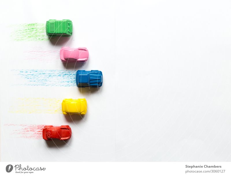 Five coloured crayon cars on a white background Car Multicoloured Motor vehicle back to school flatlay Crayon Racing car Zoom in/out travel Colour photo