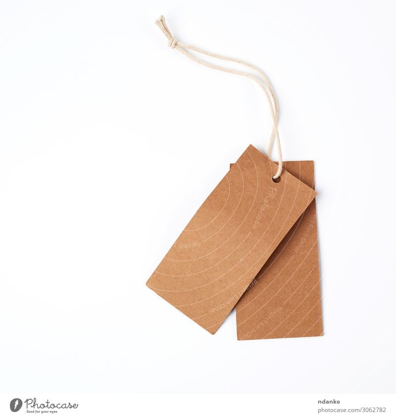 empty paper brown tag on the rope Shopping Craft (trade) Business Rope Paper Packaging Hang Sell Natural Above Brown White Conceptual design address background