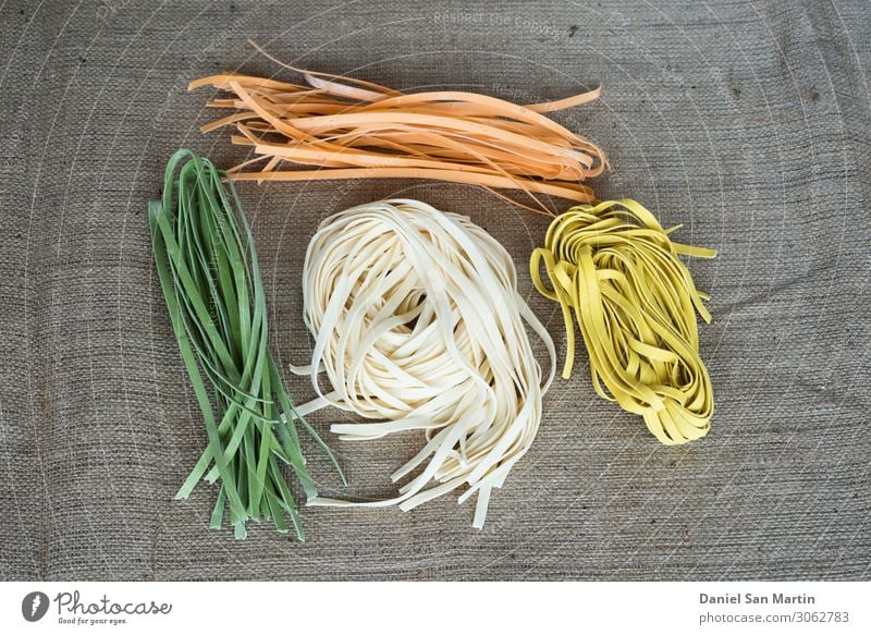 Colorful raw italian pasta on a jute fabric Dough Baked goods Nutrition Eating Lunch Dinner Organic produce Vegetarian diet Diet Italian Food Lanes & trails Tie