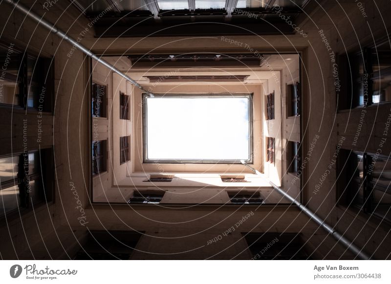 upwards shot in corridor Capital city Old town High-rise Manmade structures Building Architecture Apartment Building Brown Yellow Esthetic Advice Colour photo