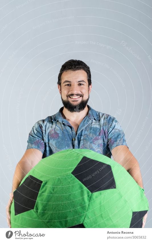 soccer ball fan sport in studio shot Joy Soccer Man Adults Shirt Balloon Smiling Stand Anger Self-confident hawaiian bearded Expression Arabia
