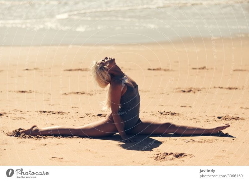 Caucasian blonde woman practicing yoga in the beach Lifestyle Beautiful Body Relaxation Meditation Summer Beach Ocean Sports Yoga Human being Feminine