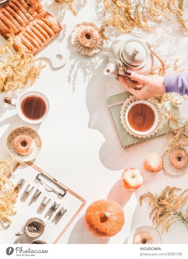 Cosy autumn at home Apple Cake Breakfast Hot drink Tea Lifestyle Style Design Living or residing Dream house Table Human being Woman Adults Hand Autumn Bouquet