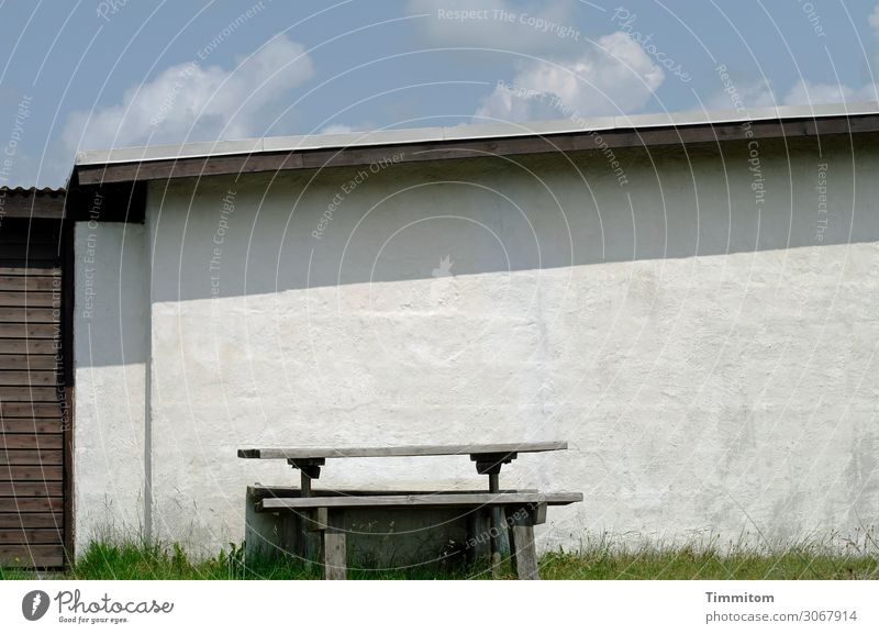 seat Vacation & Travel Denmark Architecture Vacation home Facade Roof Stone Wood Esthetic Simple Blue Brown Gray Emotions Bench Table Shadow Colour photo
