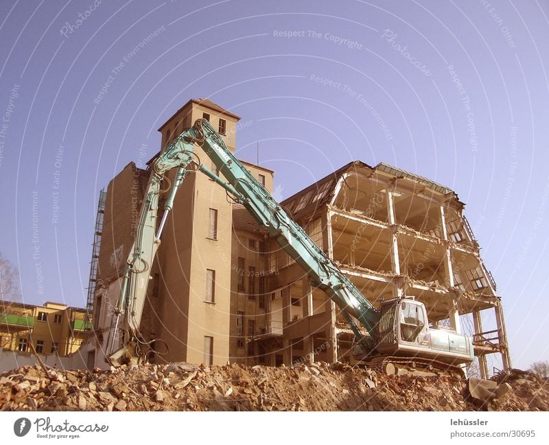 house against excavator Dismantling House (Residential Structure) Ruin Raw Story Projectile Building rubble Excavator Architecture Stone ...