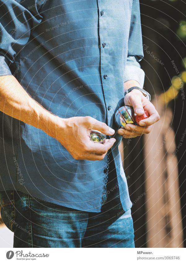 boules player Human being Hand 1 Playing Boules Sphere Upper body Summer Leisure and hobbies Stop Colour photo Exterior shot Day
