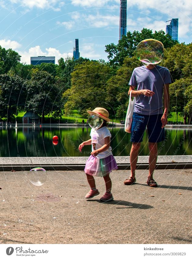 Bubble headed people chasing bubbles in the park Joy City trip Summer Sun Human being Child Girl Man Adults Father 2 Art Plant Water Sky Clouds