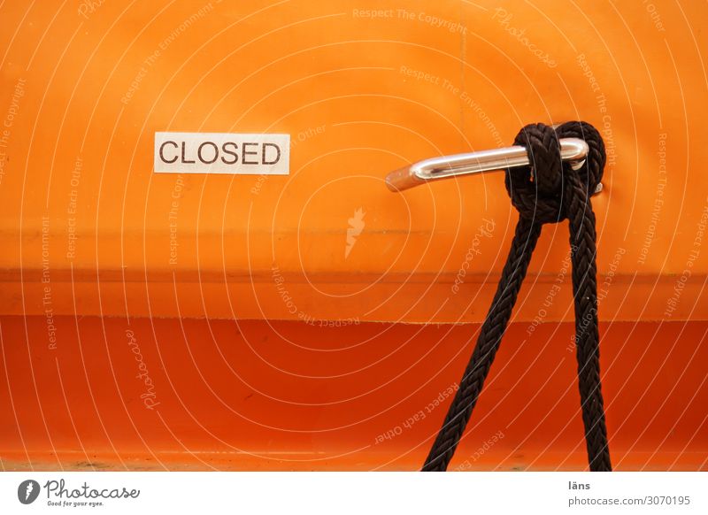 Closed - Closed Rope Navigation Boating trip Passenger ship Ferry Orange Puzzle Protection Door handle Safety Lettering Colour photo Exterior shot Deserted