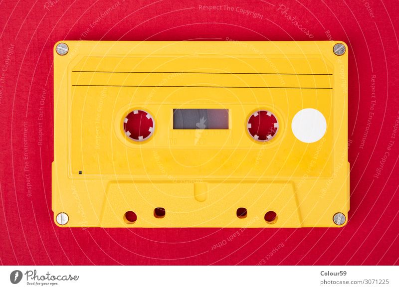 Yellow audio cassette Joy Music Technology Listen to music Media Plastic Retro Tape cassette Vintage 80s bare analogue dance isolated eighties Disco